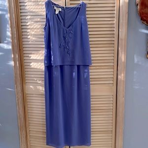 2 Petra dresses with light see through jacket.